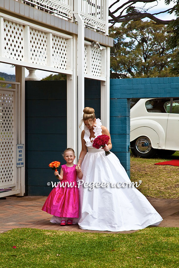 Custom Flower Girl Dresses Style 318 in Hot Pink Shock with matching Jr. Bridesmaid Style 320