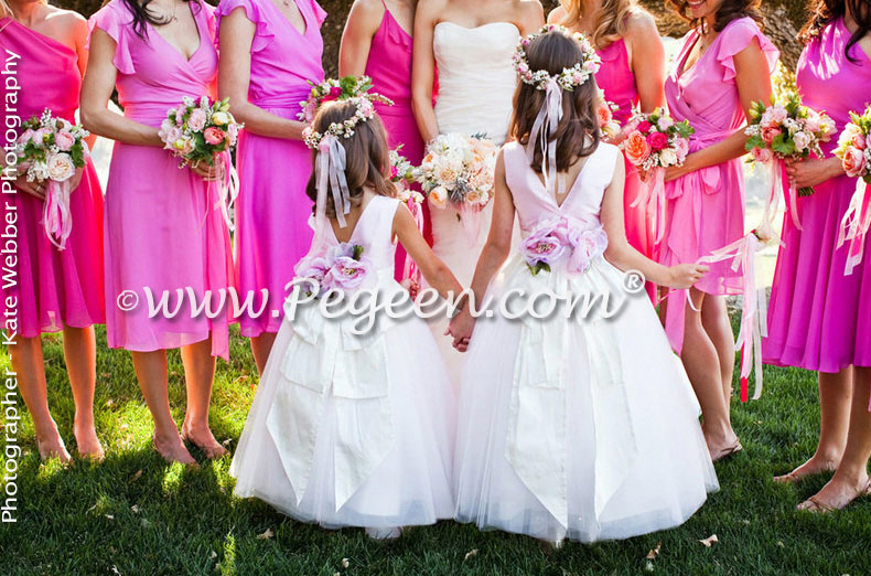 The bride choose Lotus Pink and an Antique White Signature Bustle for her flower girl dress